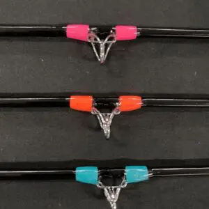 A row of three different colored wires with clips.