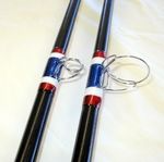 Two fishing rods with rings on them.