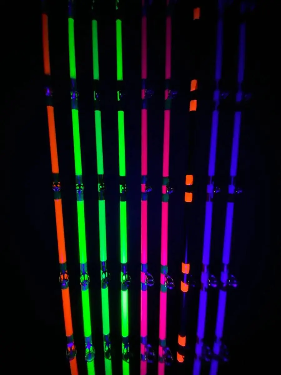 A bunch of neon lights that are in the dark