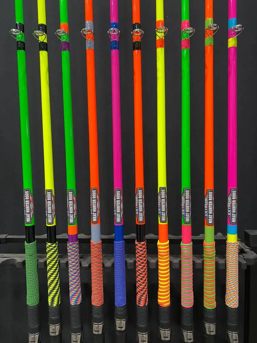 A bunch of neon colored pencils are lined up